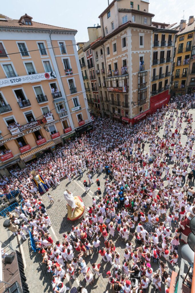 Runners navigating the crowded streets of Pamplona during the running of the bulls - Encierro Crowd Dynamics