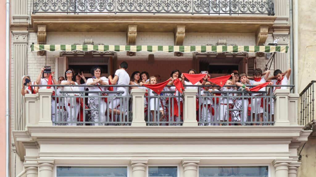 Revelers on balconies waiting for the bull run (encierro) to start