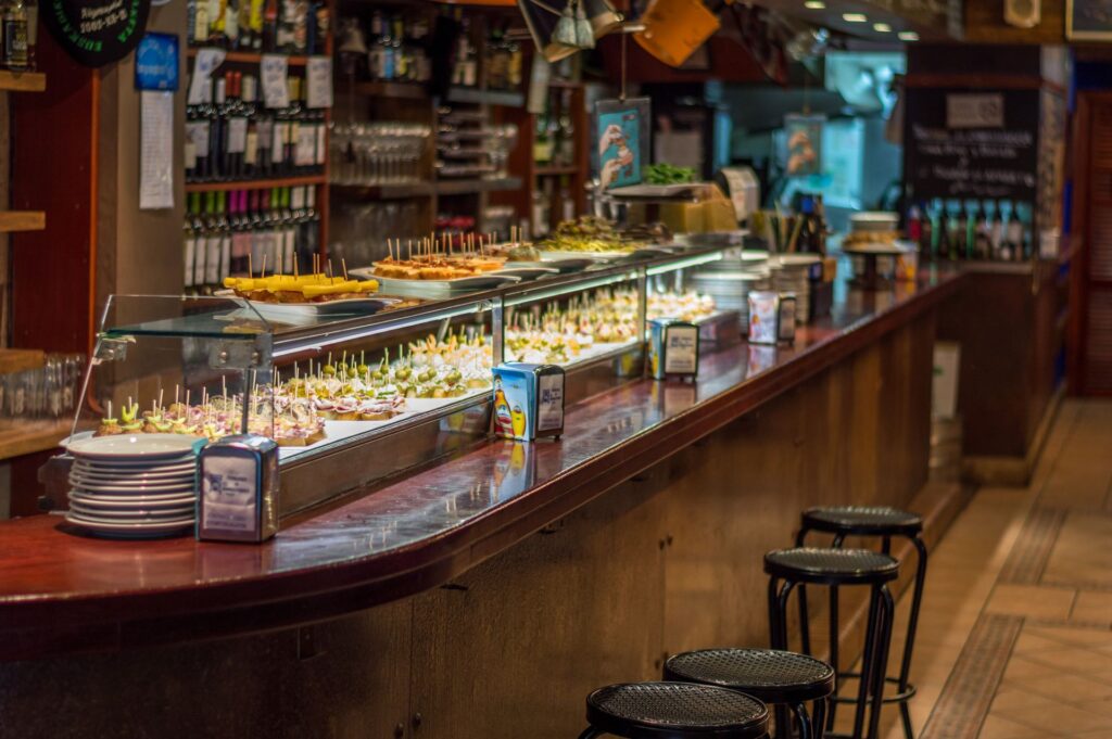 Pintxos displayed on a bar counter in northern Spain during San Fermines in Pamplona