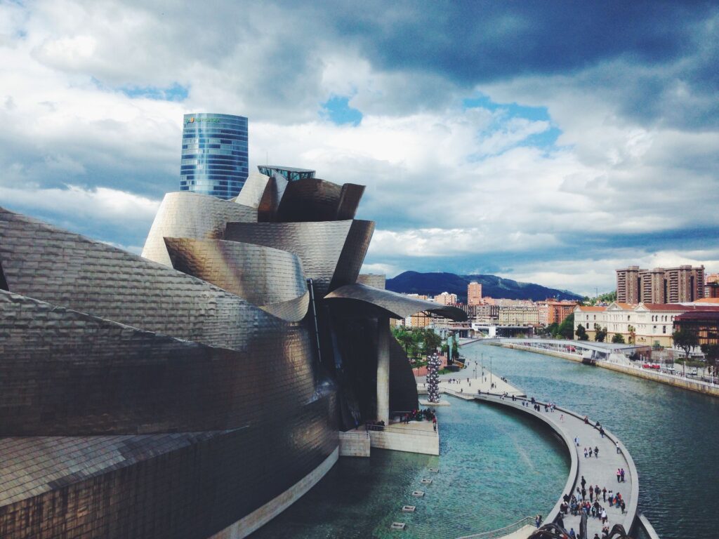Guggenheim Museum's titanium curves along the Nervion river, Bilbao