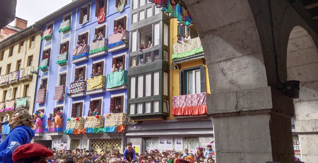 Balconies decorated for Carnaval de Tolosa along a street in the Basque Country