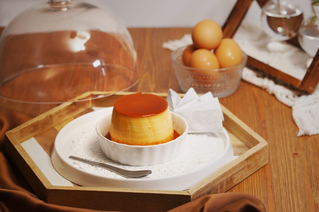 Homemade caramel flan custard on a plate, the classic Spanish dessert served in Pamplona