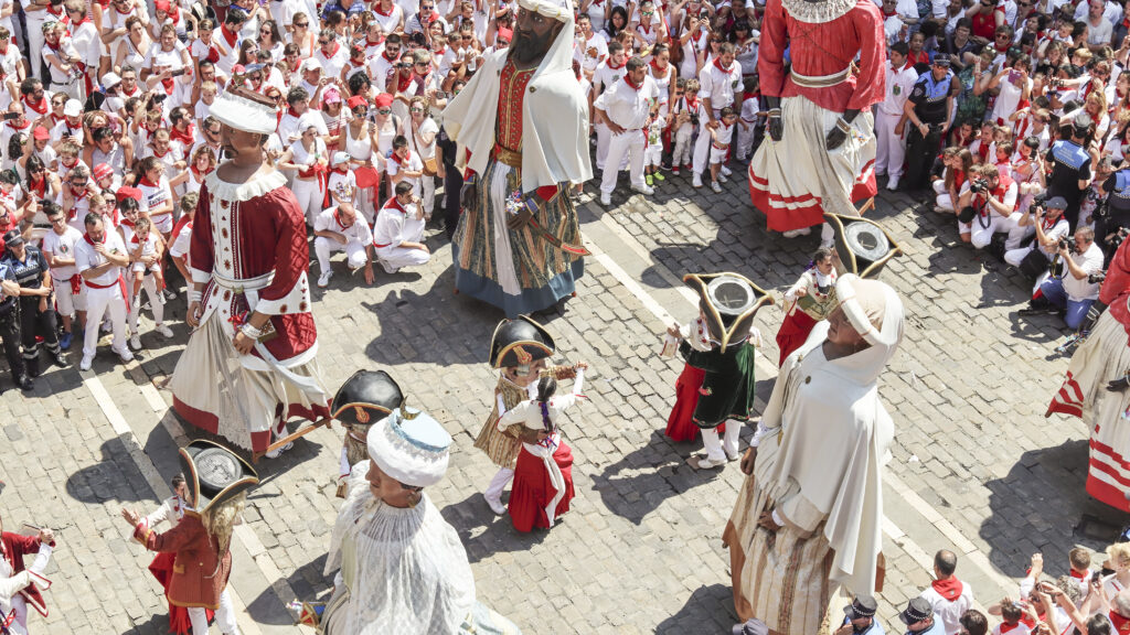 Gigantes and cabezudos figures during the closing despedida ceremony, Pamplona San Fermin