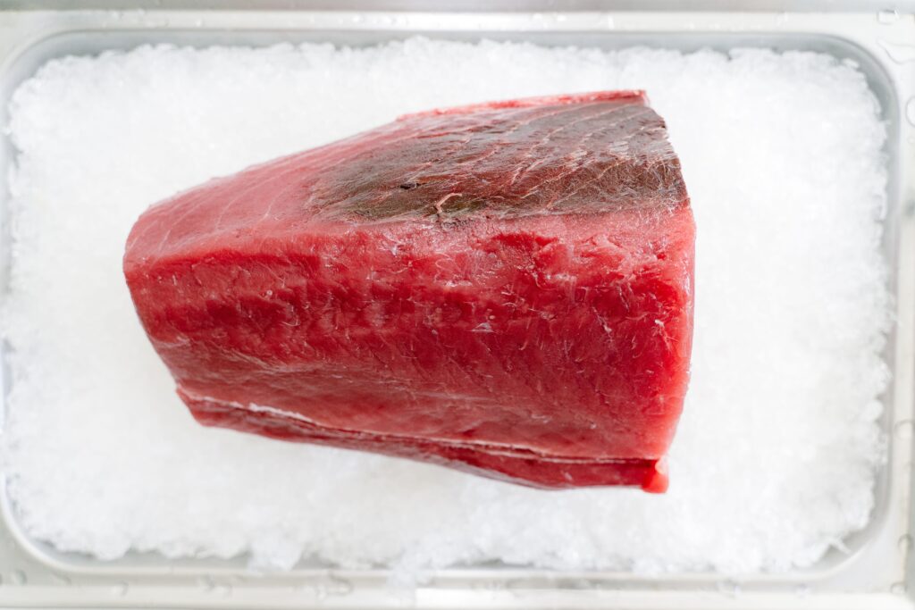Fresh raw tuna loin on ice, the fish used in Basque marmitako stew