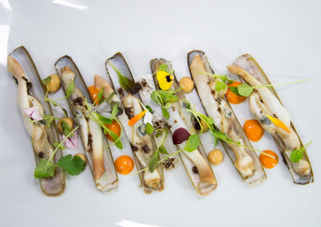 Navajas razor clams plated Spanish tapas, served in Pamplona bars