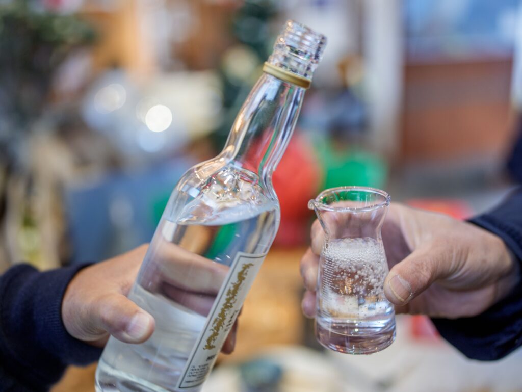 Clear spirit poured into a small shot glass, the digestif style served in Pamplona