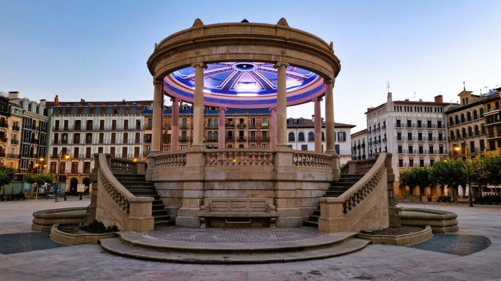 Historic bandstand kiosk in Plaza del Castillo, Pamplona, at twilight