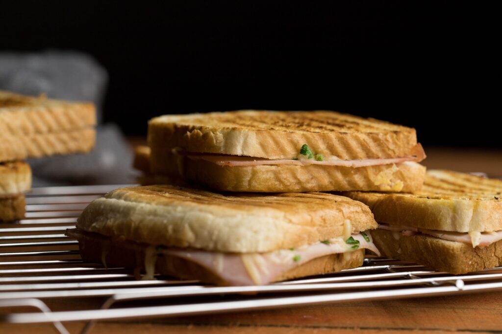 Grilled ham and cheese sandwich mixto on toasted bread, Spanish bar classic