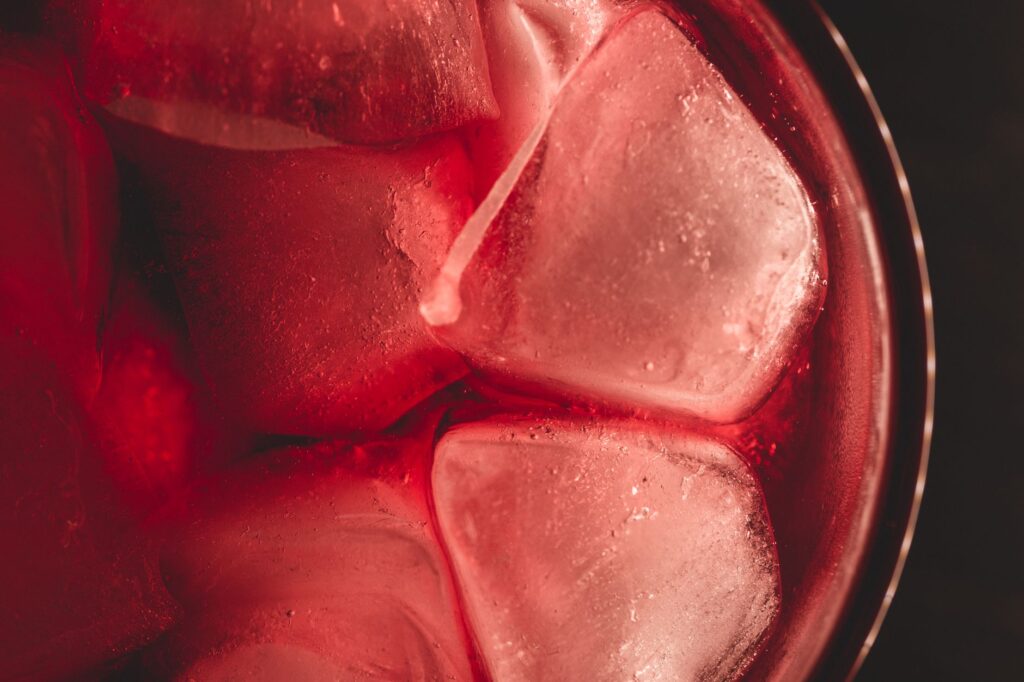 Chilled red drink over ice in the style of tinto de verano, the Spanish summer red wine and soda mix