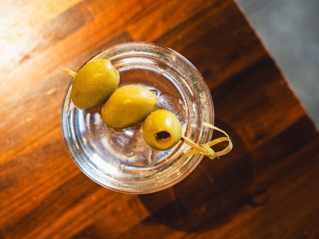 Martini vermouth on tap with olive garnish, the vermut de grifo pour in Pamplona