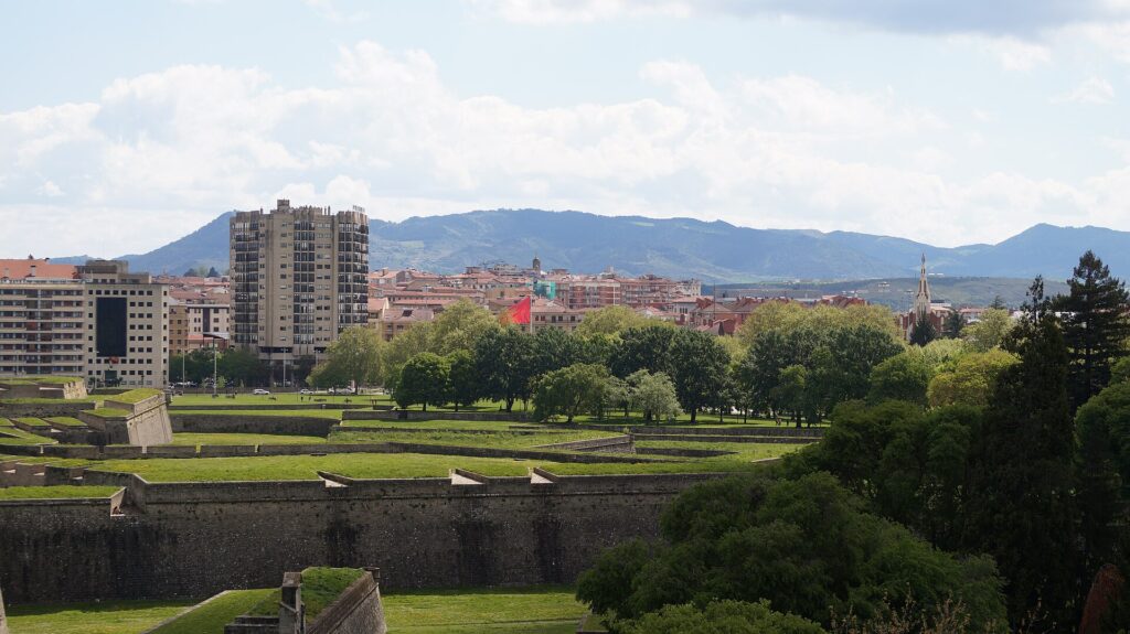 Stone walls of Pamplona's Ciudadela bordering the Vuelta del Castillo park
