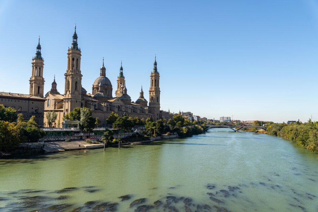 Basilica del Pilar reflected in the Ebro River in Zaragoza, Spain